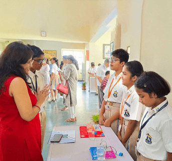 Students presenting their STEM projects at an exhibition
