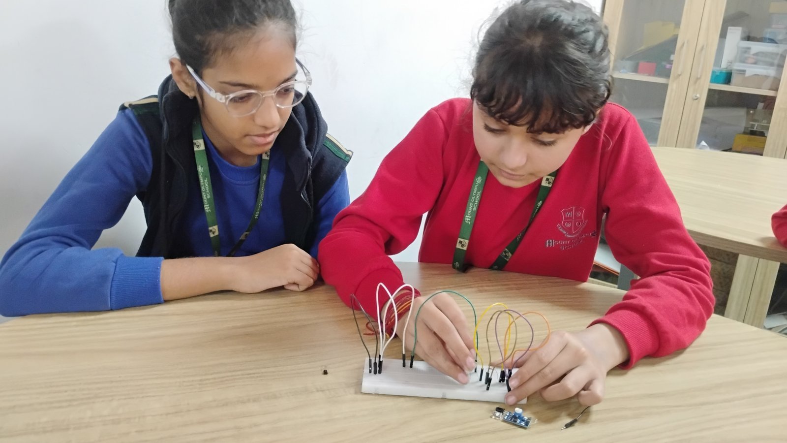 Indian secondary school students working on practical multidisciplinary skill projects involving electronics, engineering and design in a Composite Skill Lab